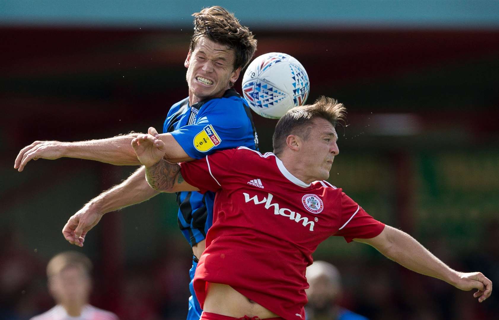 Gills' Billy Bingham competes in the air with Scott Brown. Picture: Ady Kerry