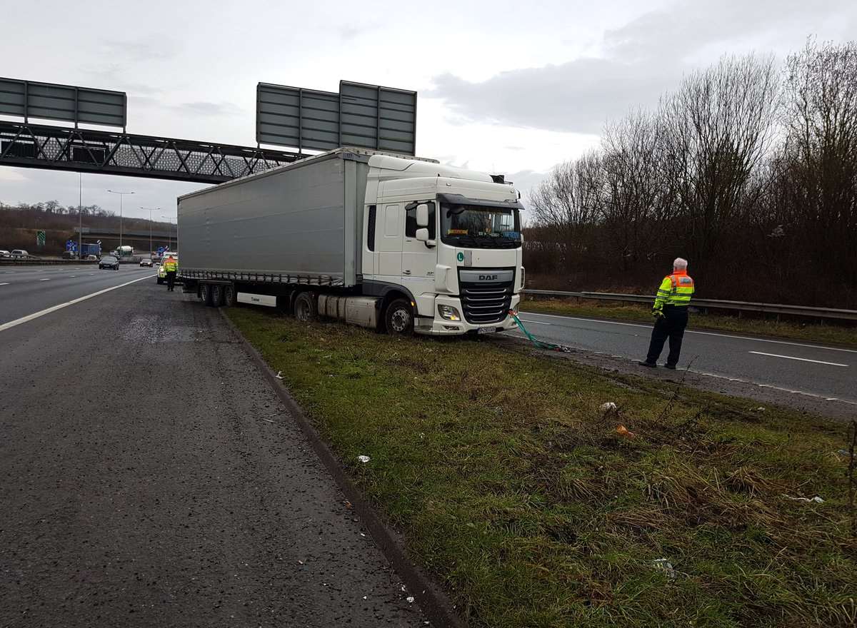 The lorry driver got his vehicle stuck on the verge trying to change lanes. picture: Kent Police