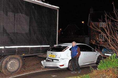 The foreign lorry driver crashed into a car as he tried to leave Chetney View, Iwade, after getting stuck in the narrow residential street