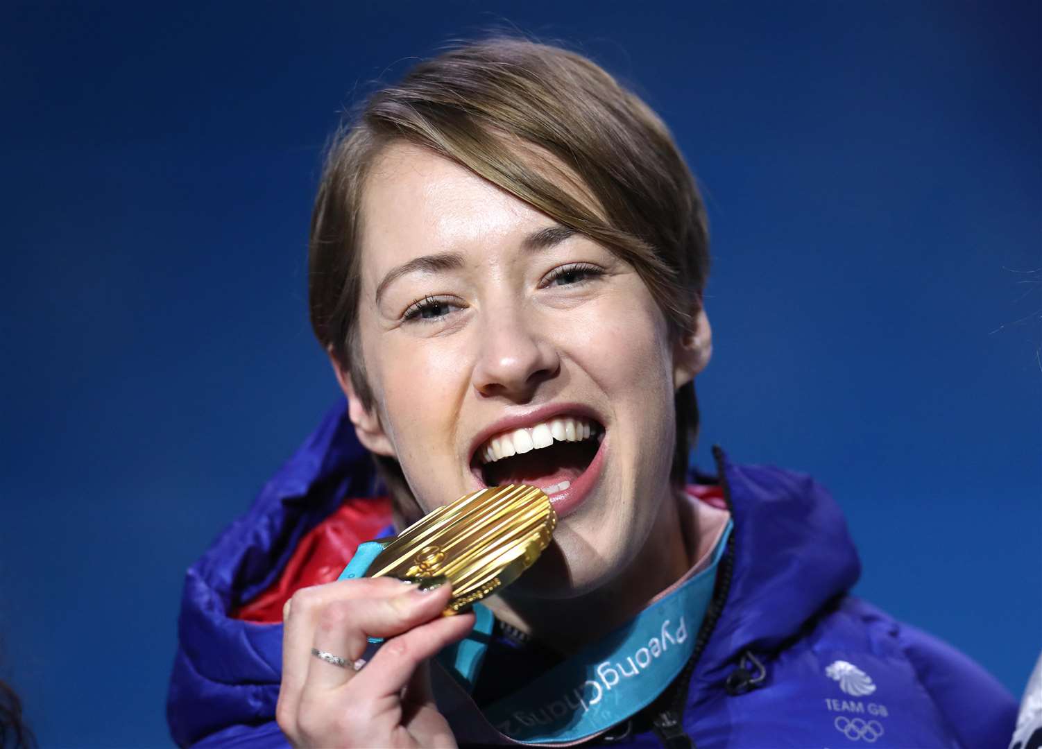Great Britain's Lizzy Yarnold poses with her gold medal during the medal ceremony for the Women's Skeleton on day nine of the PyeongChang 2018 Winter Olympic Games in South Korea. ... PyeongChang 2018 Winter Olympic Games - Day Nine ... 18-02-2018 ... PyeongChang ... South Korea ... Photo credit should read: Mike Egerton/PA Wire. Unique Reference No. 35060143 ... Picture date: Sunday February 18, 2018. See PA story OLYMPICS Skeleton. Photo credit should read: Mike Egerton/PA Wire. RESTRICTIONS: Editorial use only. No commercial use.. (2750699)