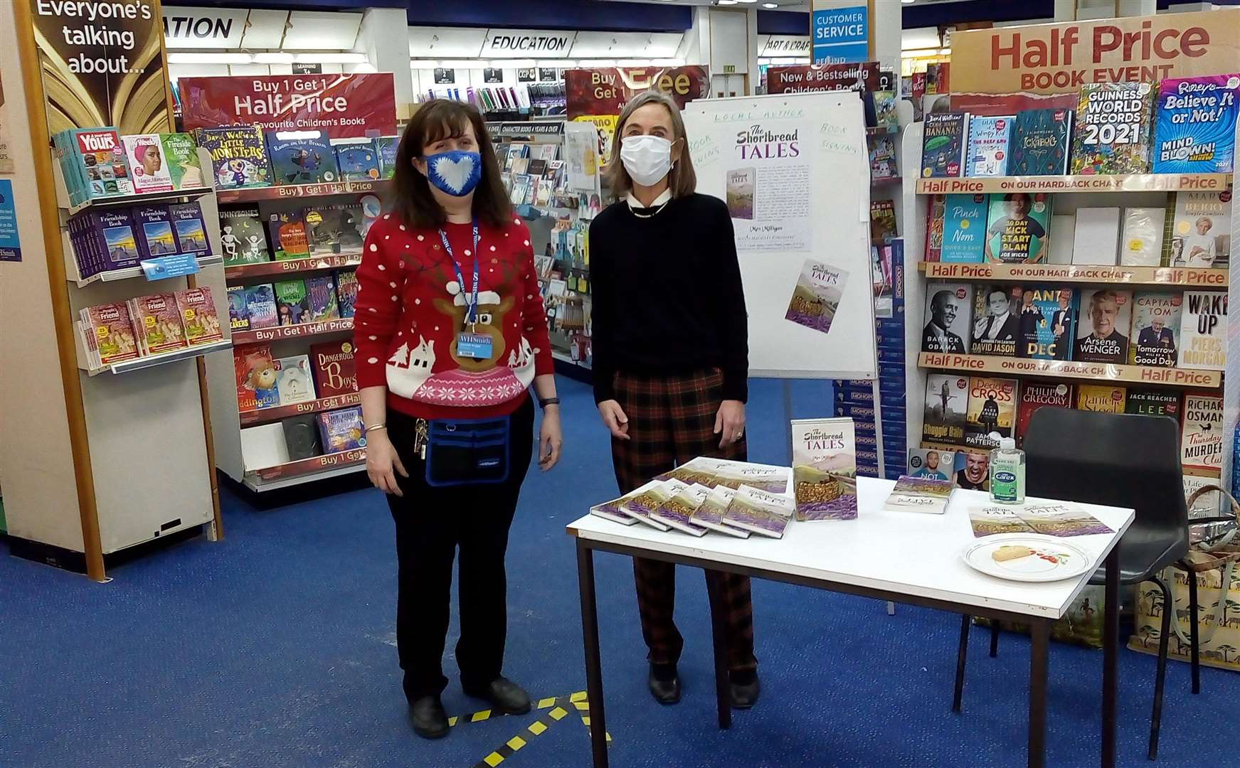 Tessa Milligan at WHSmiths with the store manager Kendall Briggs