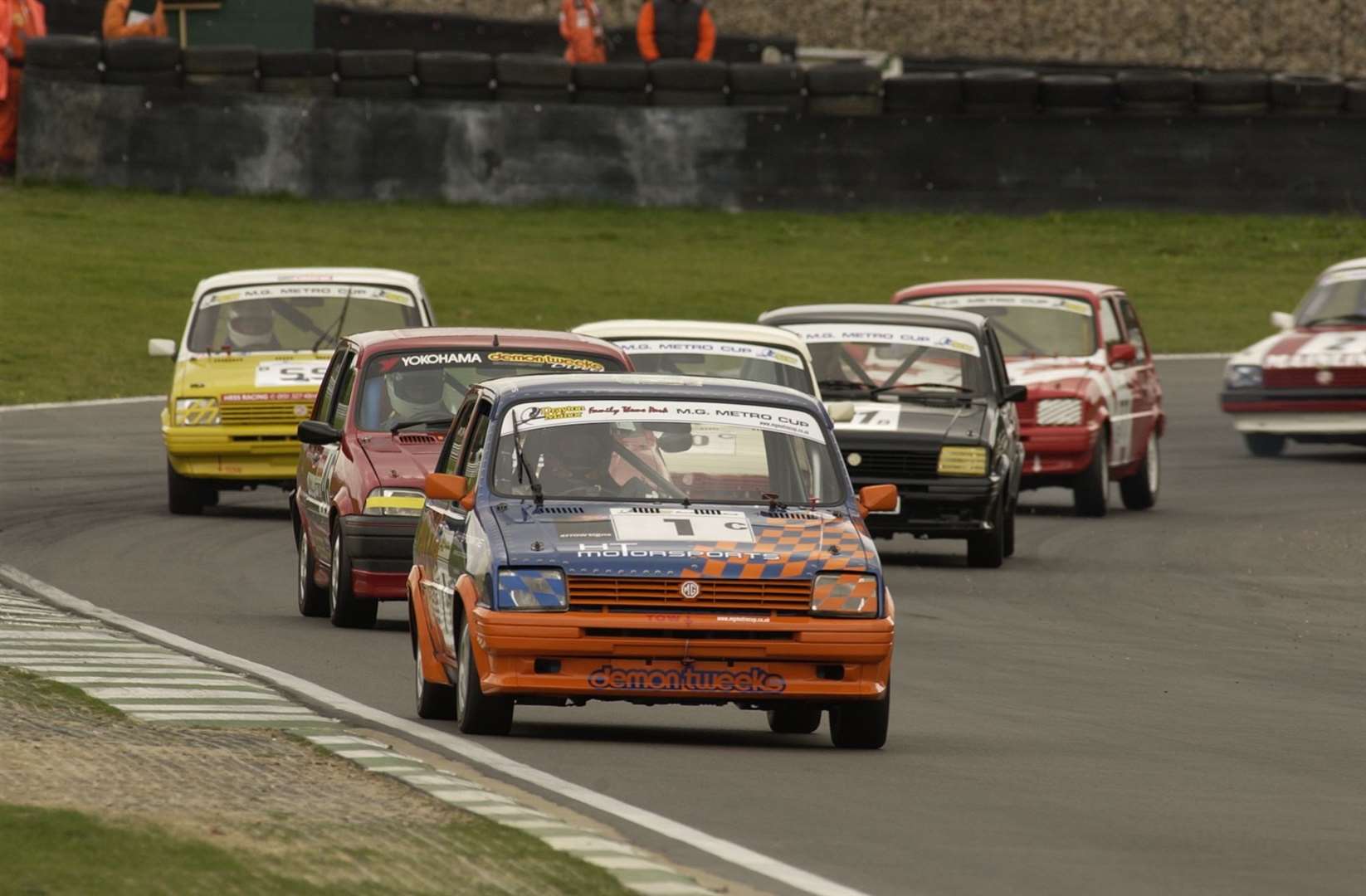 An MG Metro Cup pack charges along the Cooper Straight at Brands Hatch in September 2002. Picture: Andy Payton