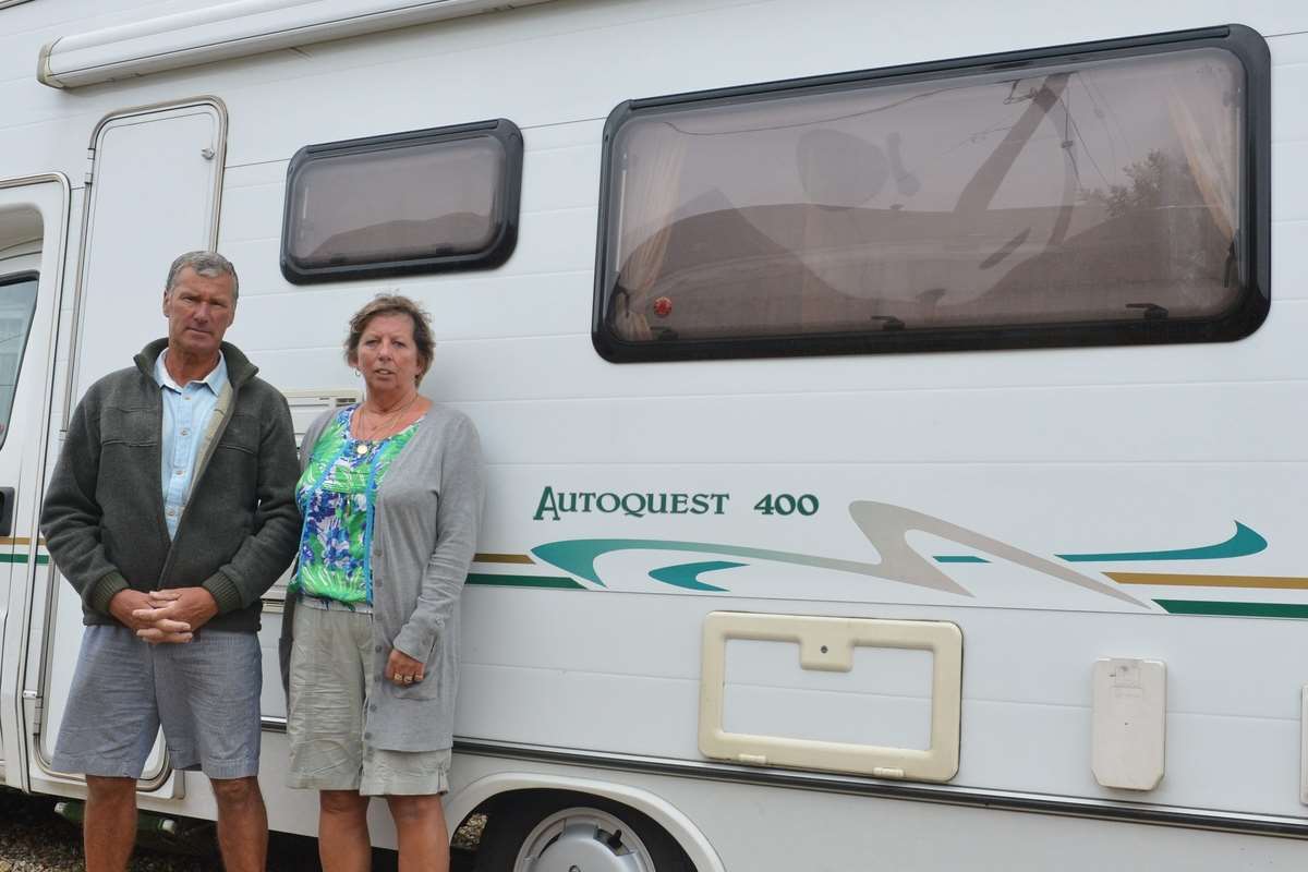 Manston couple Debbie Keeney and Bob John outside their campervan. Picture: SWNS.com/Tony Kershaw