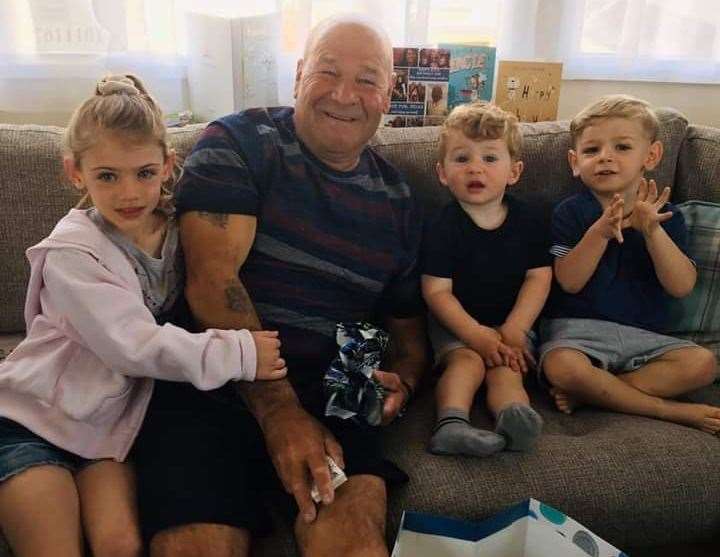 John Picot with grandchildren Lily Dodd, Tommy Picot and Harry Dodd. Photo credit: Louise Spree