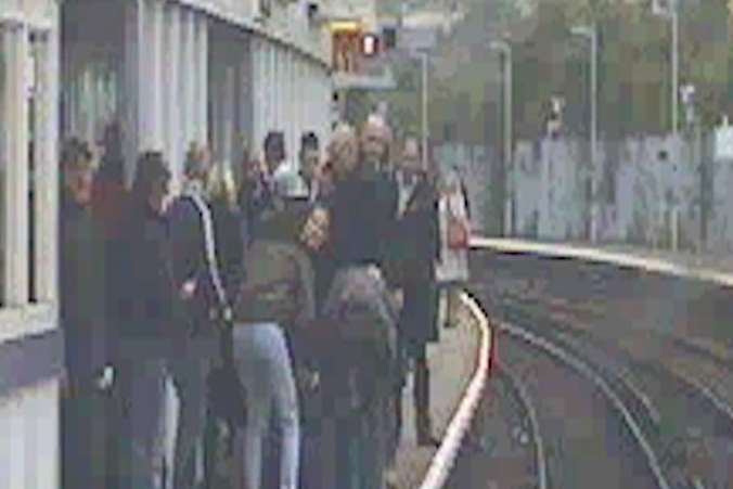 Passengers help out after Mrs Smith fell onto the tracks