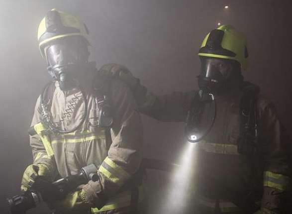 Crews wore breathing apparatus to tackle the fire. Stock picture.