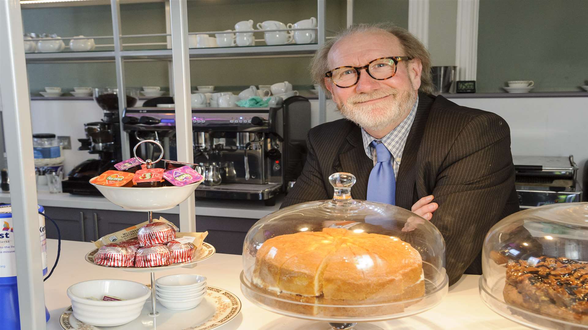 David Philpott, pictured at the opening of a cafe for the Kenward Trust, has stepped down as chairman of CXK