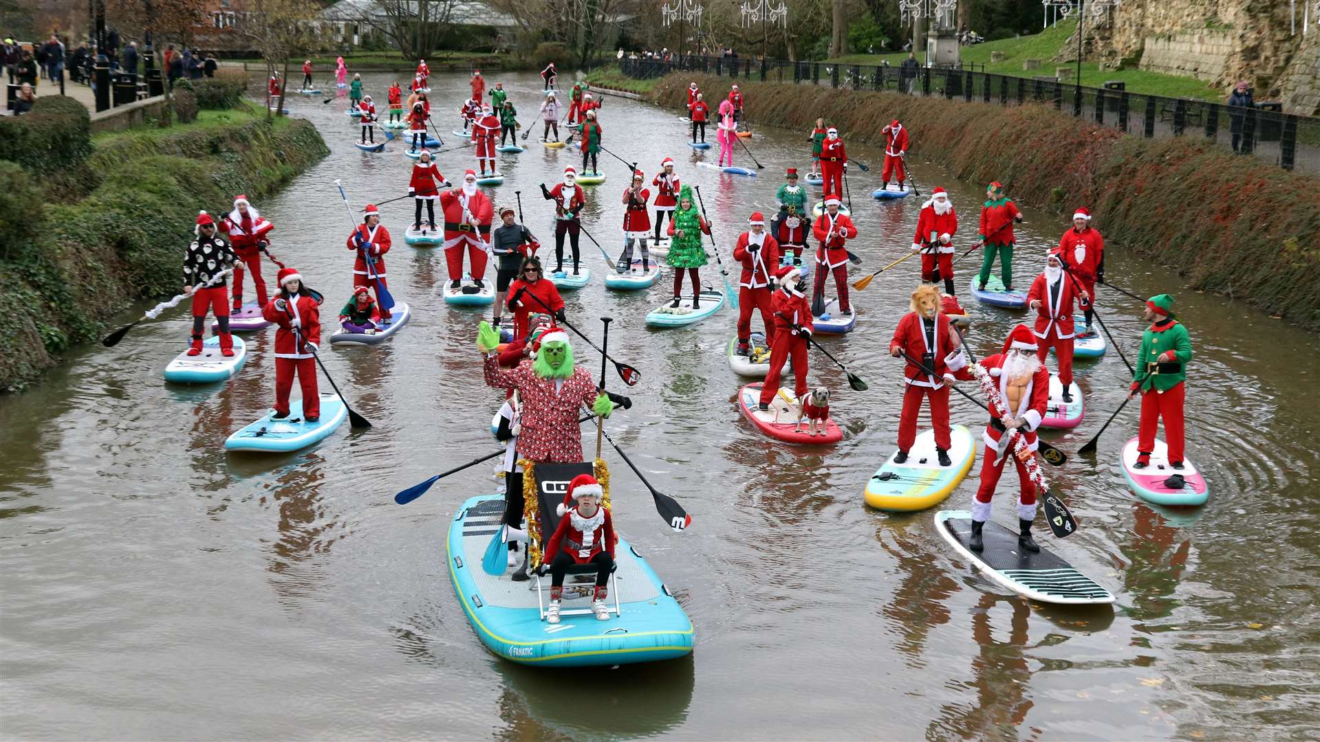 Santa paddle boarders on the river at Tonbridge Picture: Sean Aidan