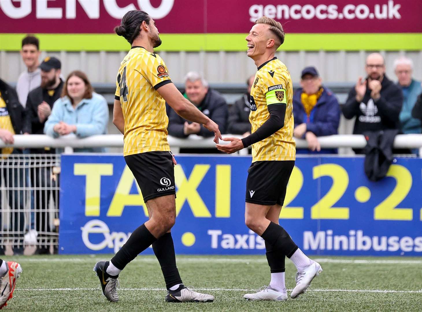 Sam Corne, right, celebrates his stunning volley with Harry Kyprianou. Picture: Helen Cooper