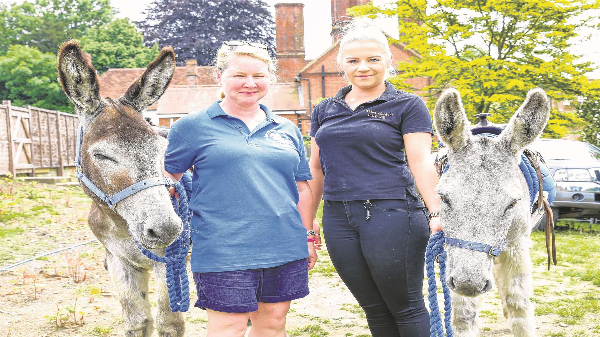 Julie Wilding and Lauren Cansick with Smokey and Bandot the donkeys at the Tickled Trout. Picture by: Matthew Walker