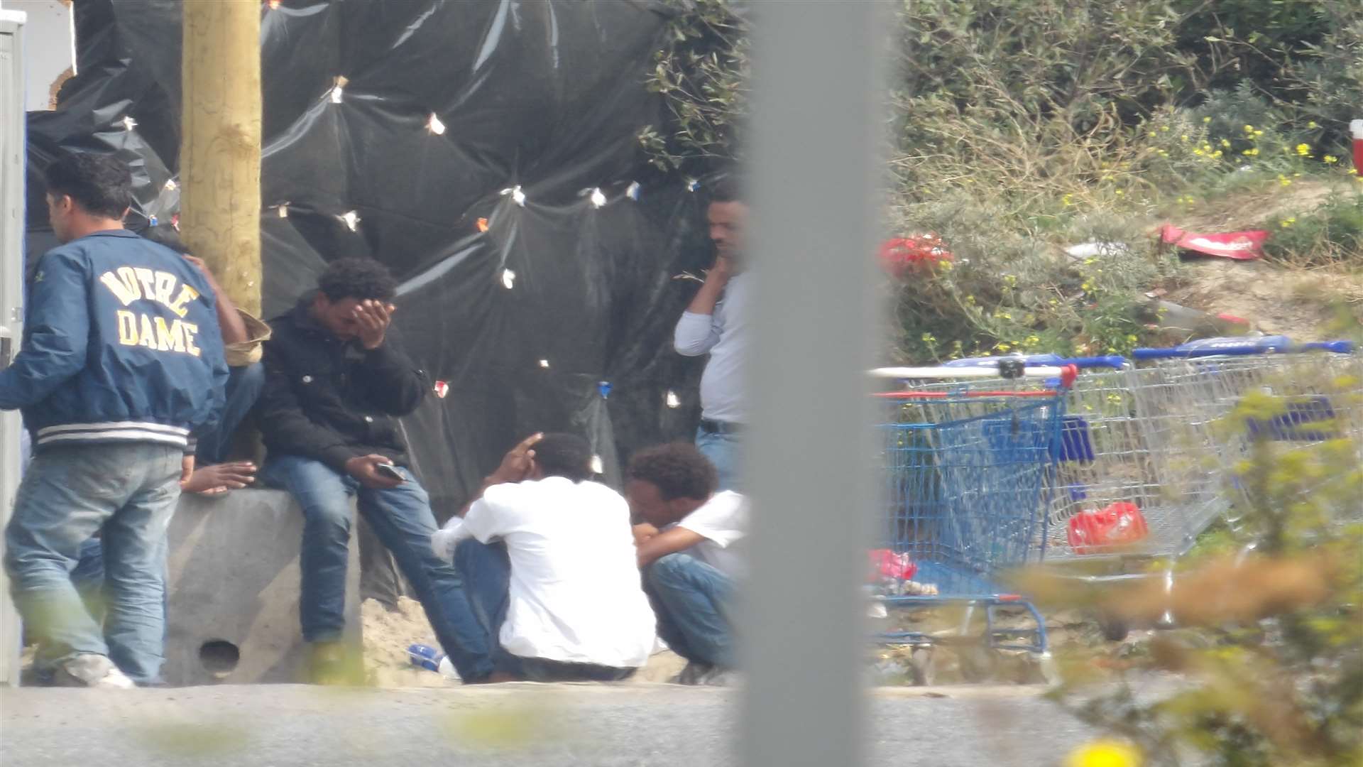 Migrants at the Calais camp known as The Jungle before work began to dismantle it