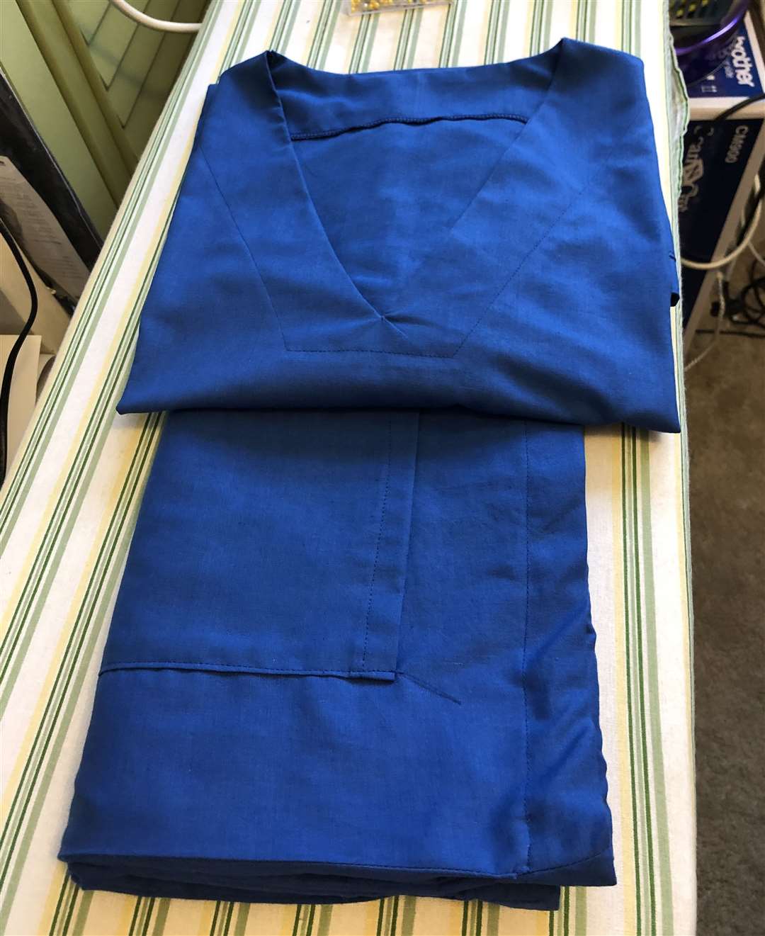 A completed set of scrubs which will be donated to a nearby hospital