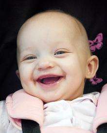 All smiles - nine-month-old Darcie Kay has ended gher cancer treatment.