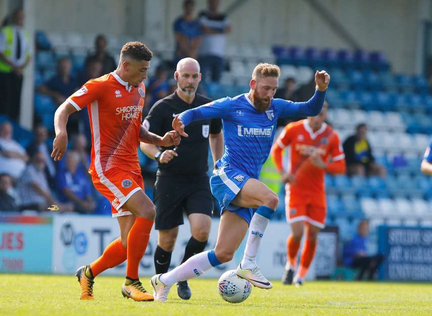 Scott Wagstaff driving forward for Gillingham Picture: Andy Jones