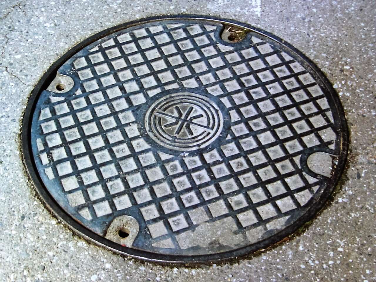 The object turned out to be a drain cover. Stock image - wikimedia