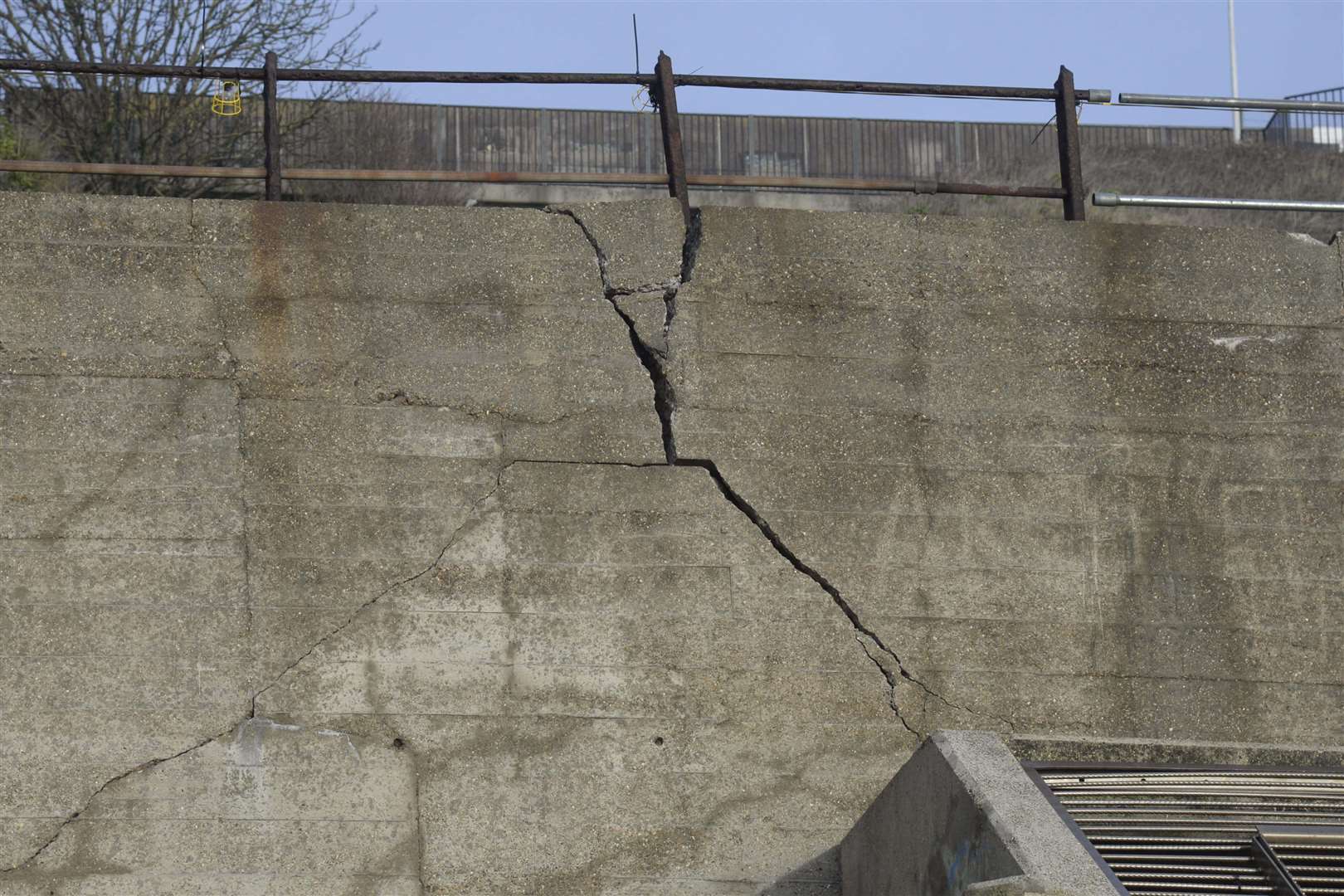 The deep cracks that appeared in the sea wall