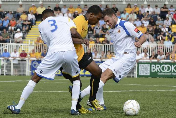 Maidstone's Orlando Smith goes head to head with Wealdstone in Saturday's Ryman League Premier Division opener