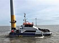 The Tempest taking in water by one of the wind turbine towers. Picture: Sheerness RNLI