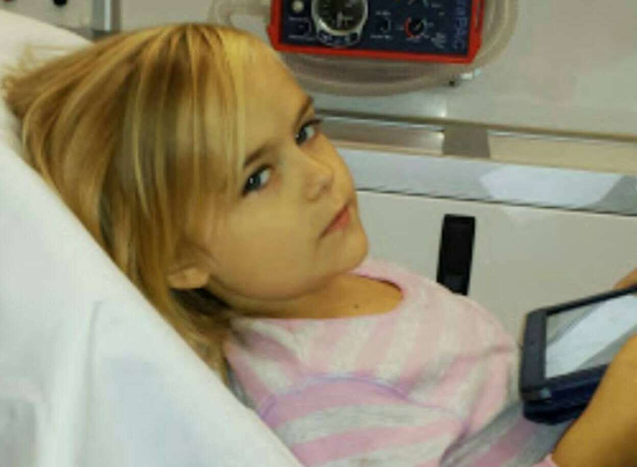 Megan when she was rushed to hospital in August 2013