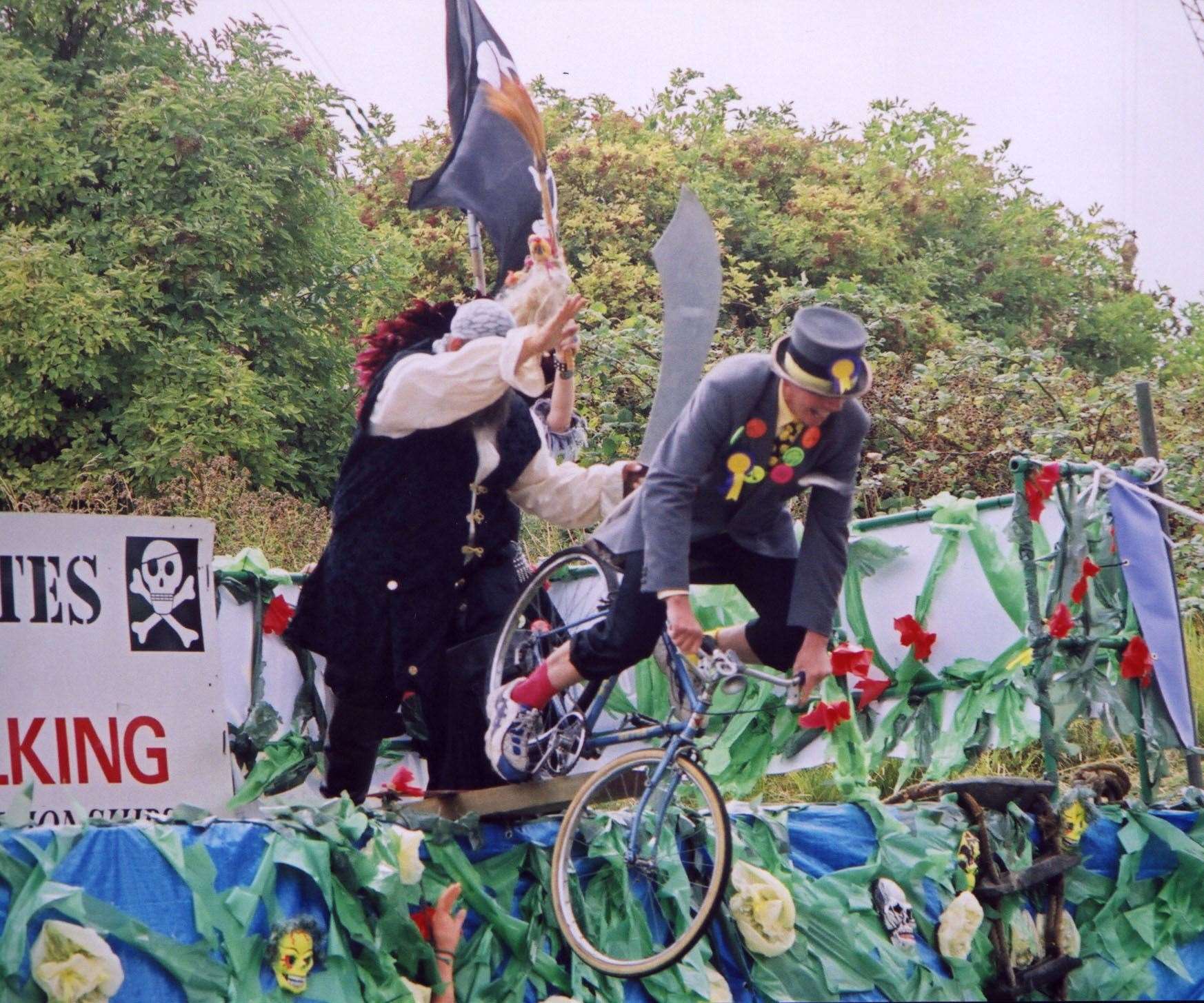 Going... Mad Mike Young and bike take the plunge at the fifth World Walking the Plank Championships at Queenborough on the Isle of Sheppey on August 19, 2001. Photo Mike Smith