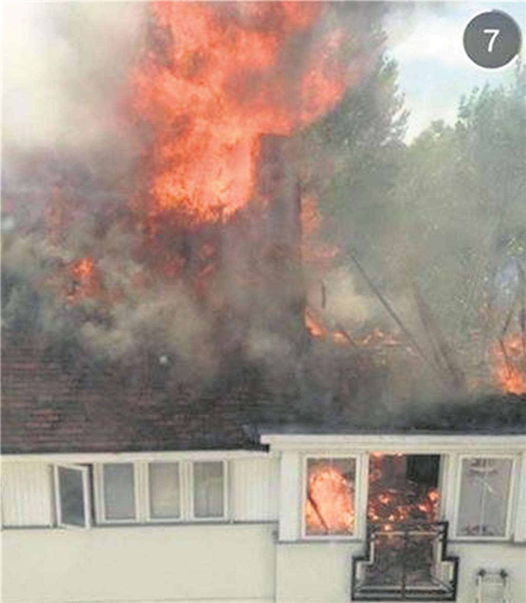 Fire rips through the roof of the flats