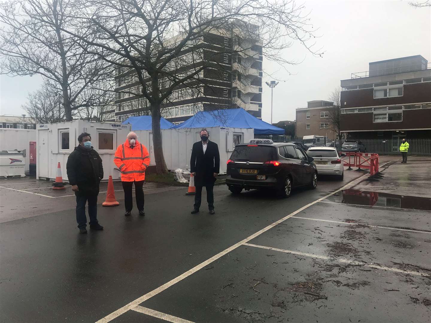 Dr Tuan Nguyen, Cllr David Monk and MP Damian Collins at the Civic Centre vaccine site in Folkestone. Picture: Damian Collins Twitter