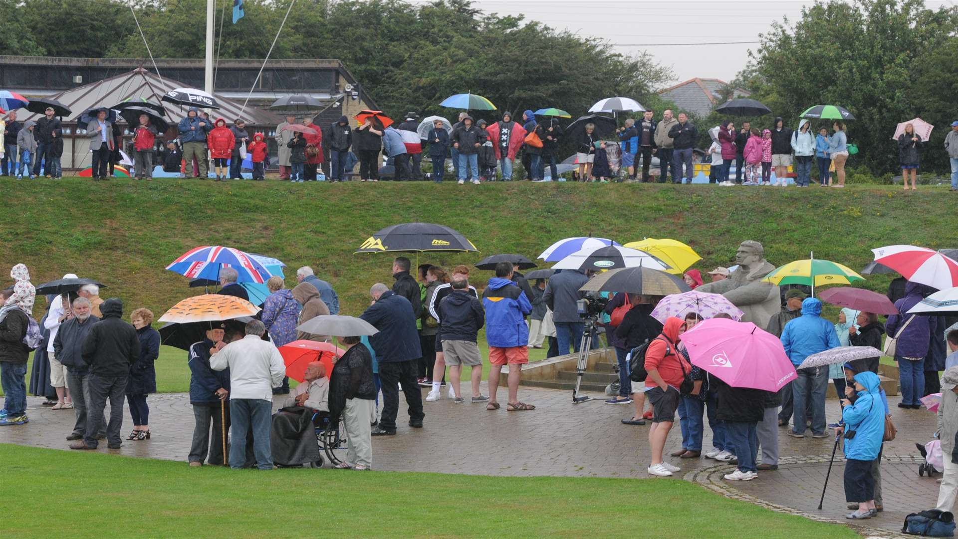 Scores of people braved the bad weather. Picture: Wayne McCabe