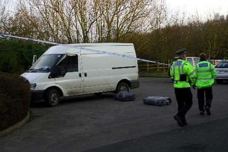 Police at the scene where the white Ford Transit van was found. Picture: PHIL HOUGHTON
