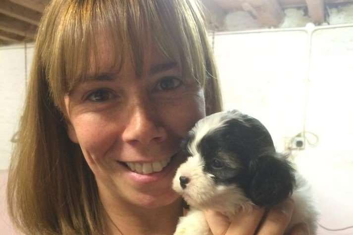 Laurie Macpherson, with her puppy Penny, couldn't be a teacher without good grades