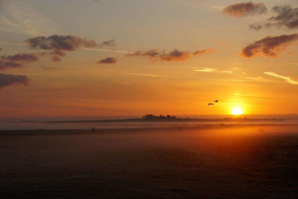 Sunrise over Capel Hill by Phil Haynes - the photo won him first prize