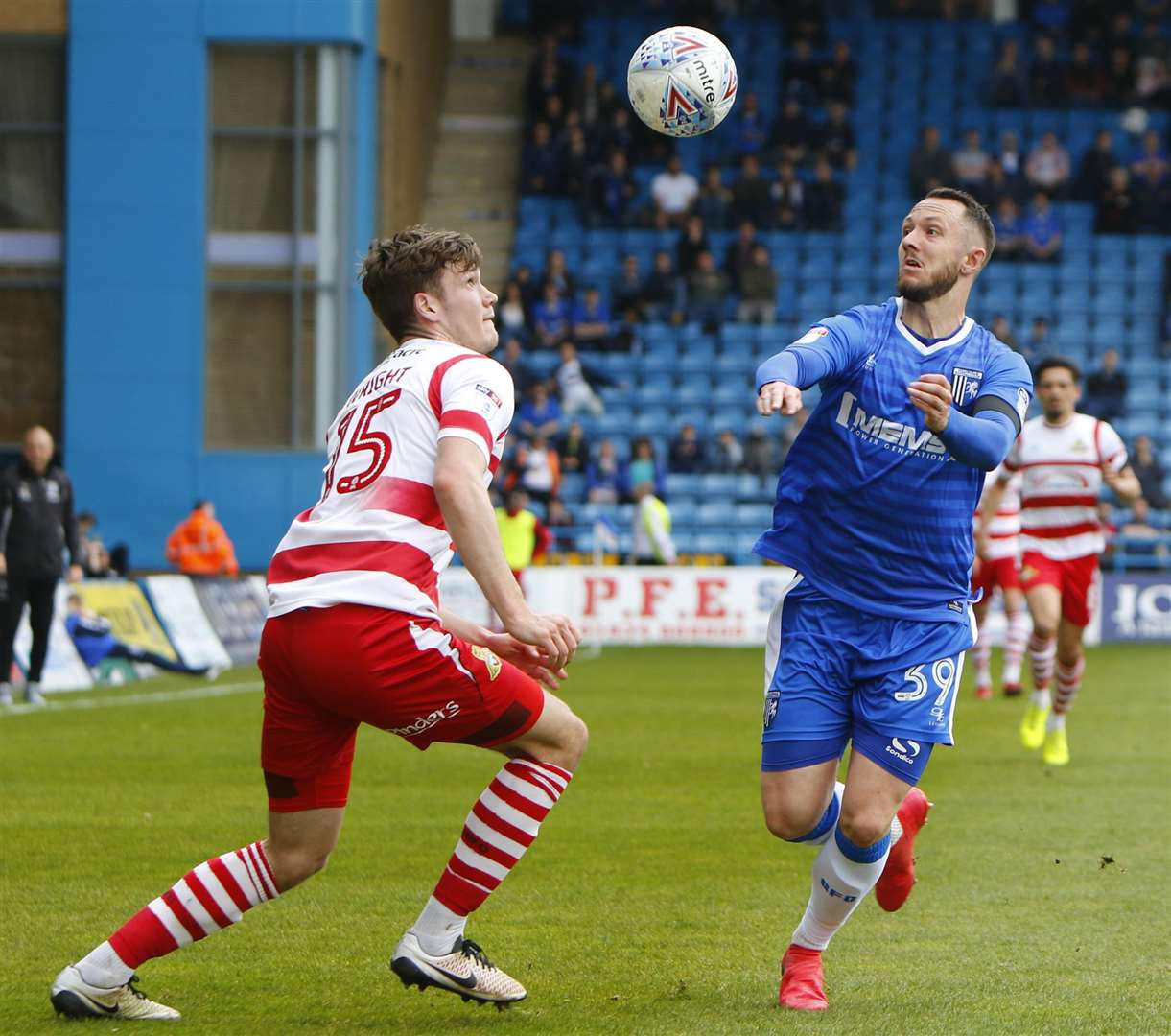 Forward Rhys Murphy has his eye on the ball during his Gillingham debut on Saturday. Picture: Andy Jones