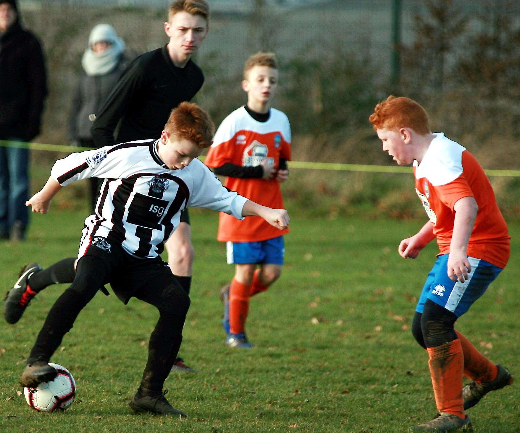 Milton and Fulston United Zebras under-12s on the ball against Cuxton 91 Dynamos under-12s. Picture: Phil Lee FM26563364