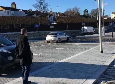 Tim Read, Head of Highway Transport at KCC watches a driver make off after crashing into a new road sign at the new drop-off area in Rathmore Road, Gravesend
