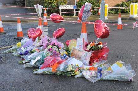 Floral tributes at the scene of a shooting that killed Kevin Mckinley in Dartford