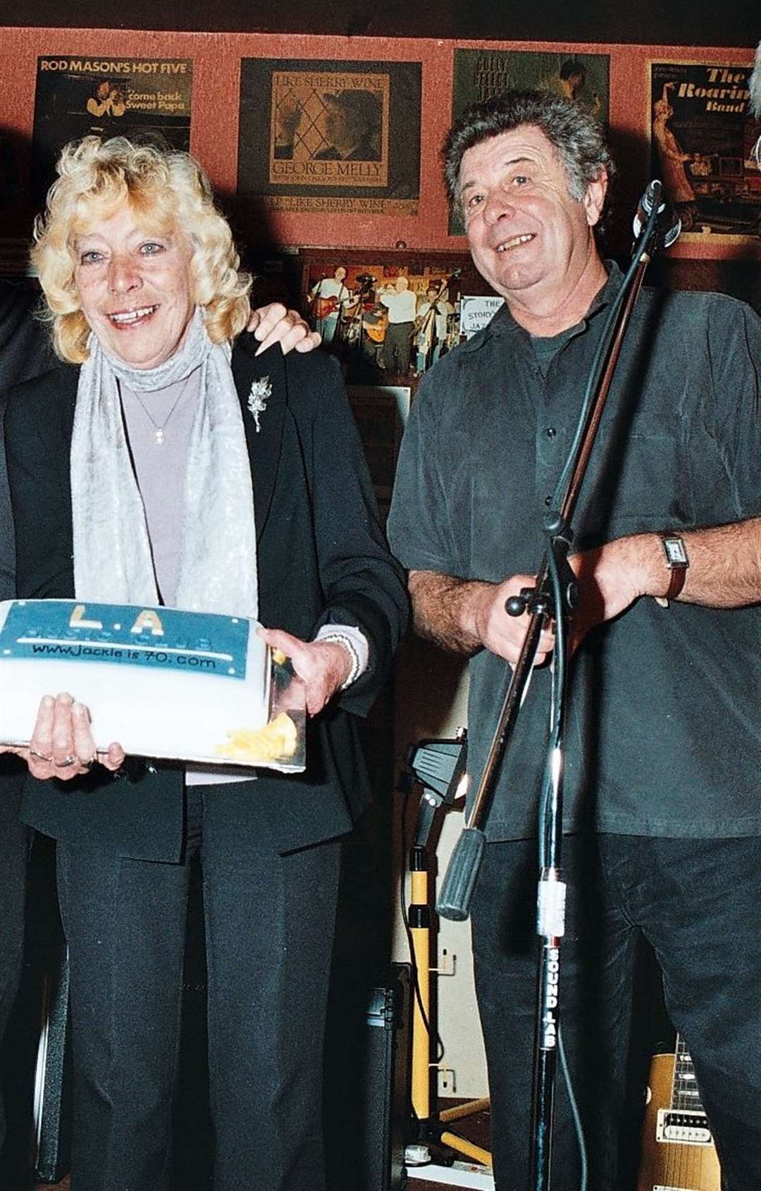 Mrs Bowles on her 70th birthday in 2009 with musician Mick Morris. Picture provided by Mick Morris