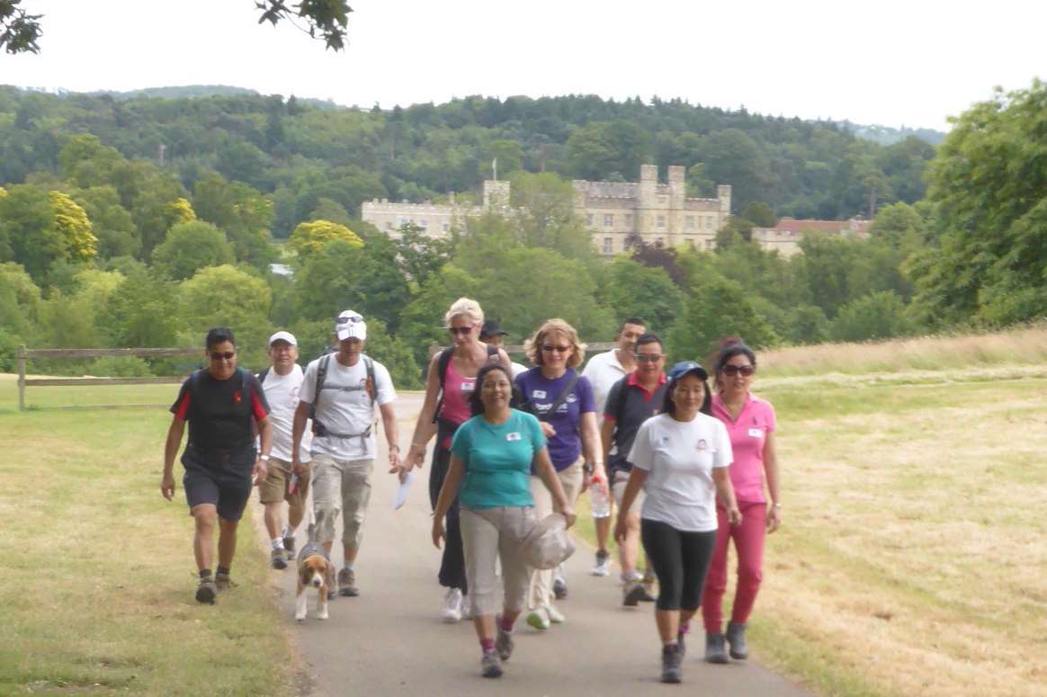 Walkers enjoy the views of Leeds Castle at the KM Charity Walk 2015.