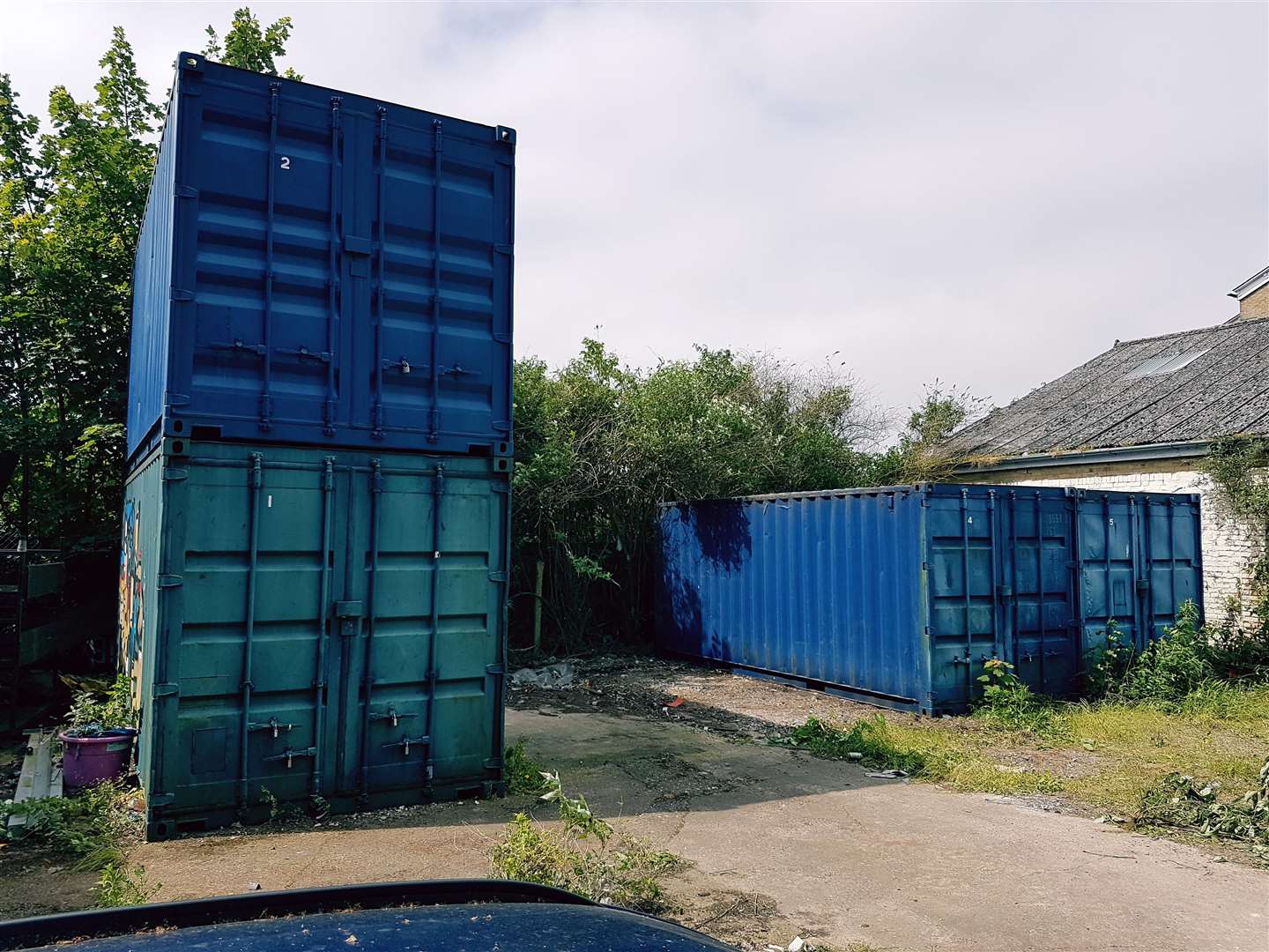 Containers filled with theatre equipment is all that remains at the site.
