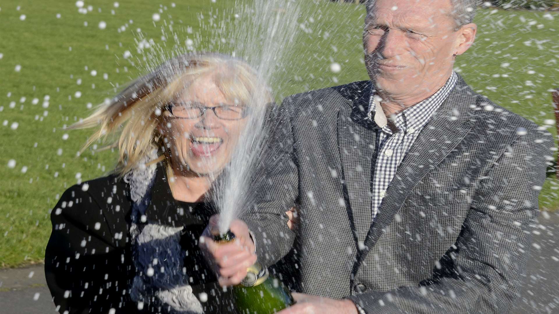 Folkestone couple Marjorie and Alan Tyrie celebrate their £1m lottery win. Picture: Paul Amos
