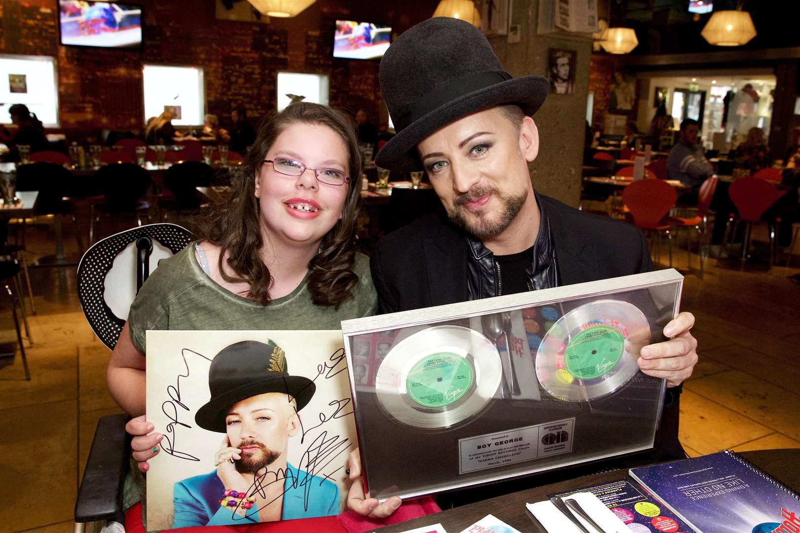 Margate teen Poppy Chatfield meets Boy George at Planet Hollywood in London