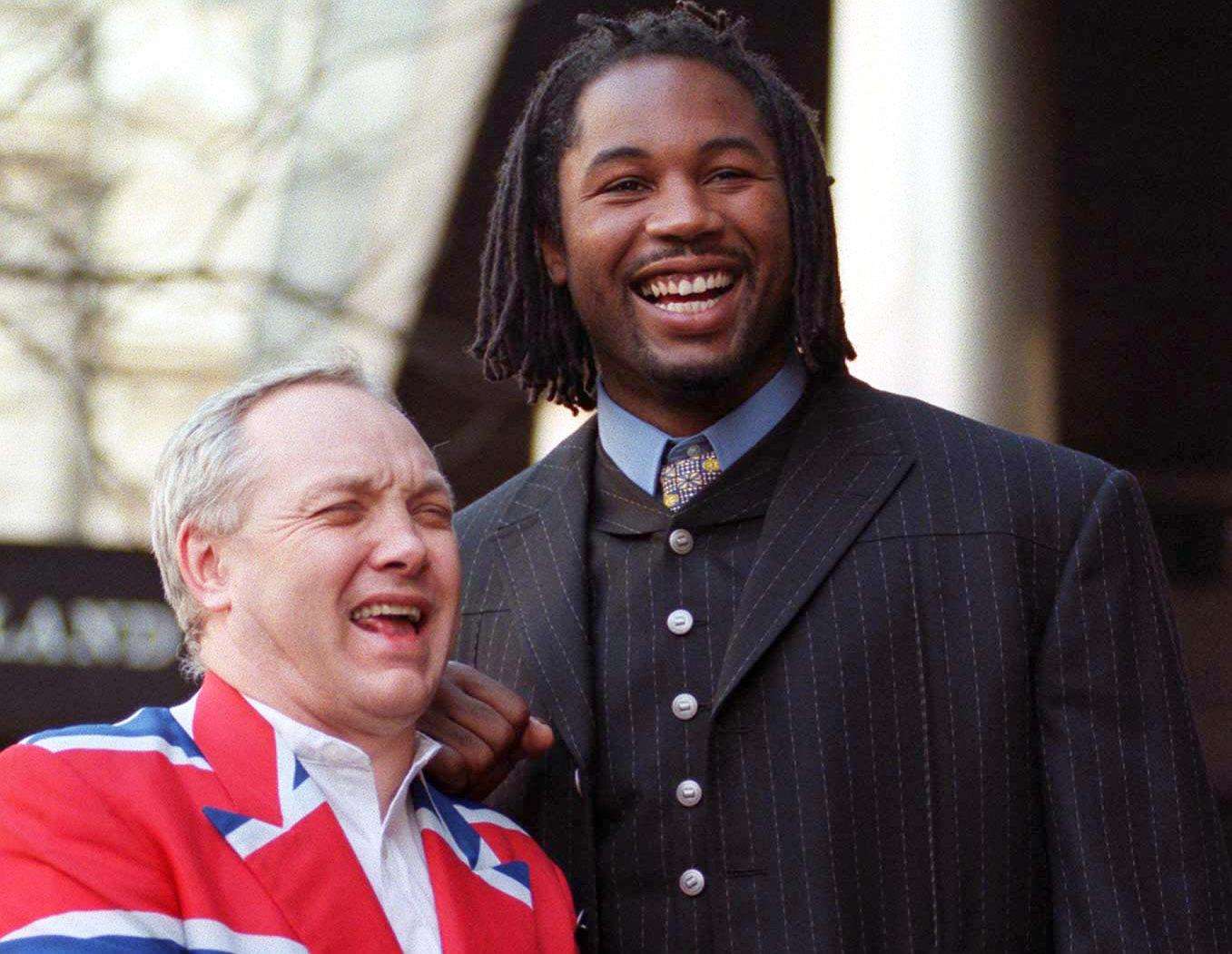 Lennox Lewis, right, with then-manager Frank Maloney