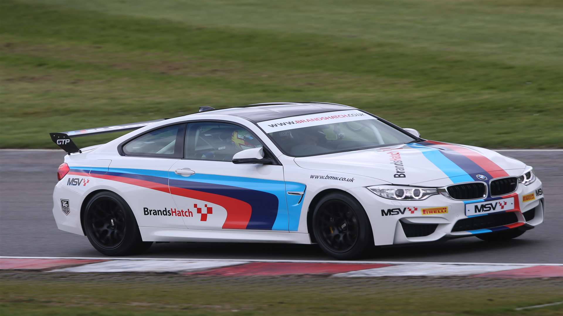 Priaulx takes KM reporter Dan Wright for a high-speed four laps in MSV's new BMW M4. Picture: Jakob Ebrey