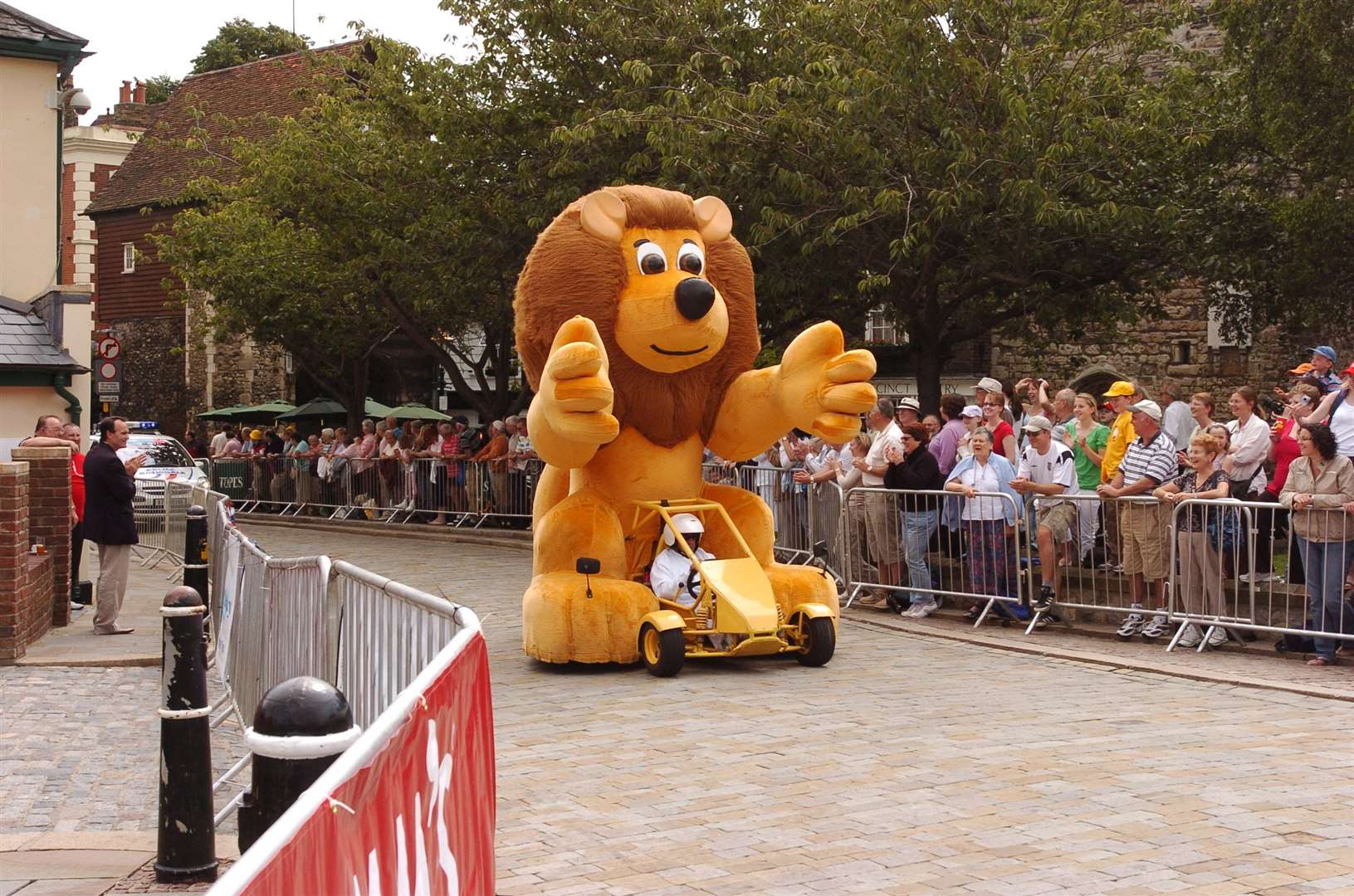 The Tour de France lion mascot makes his way through Rochester. Pic: Jim Rantell