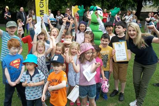 Children from St Peter's Methodist School, Canterbury celebrate being named Westgate Parks VIPs by Anna Williams Westgate Parks Development Officer (right) at Buster's Big Bash.