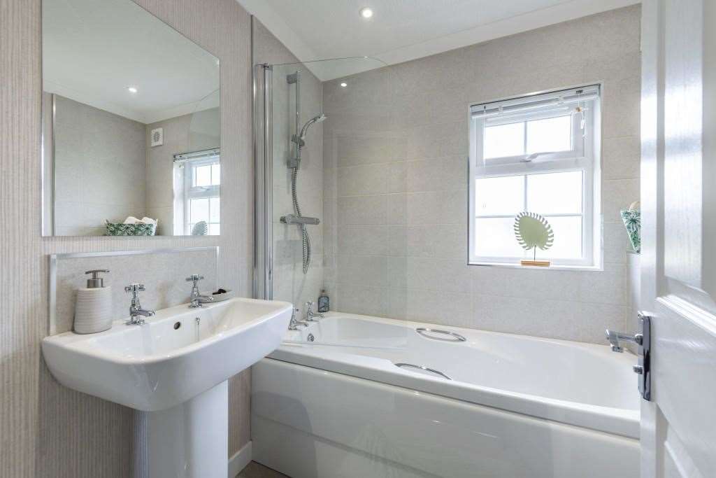 There are two bathrooms, including a family bathroom and en-suite. Picture: Quickmove Properties