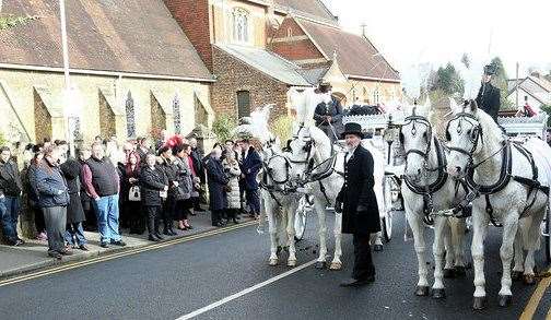 Mourners outside the church before the service. Picture: UKnip