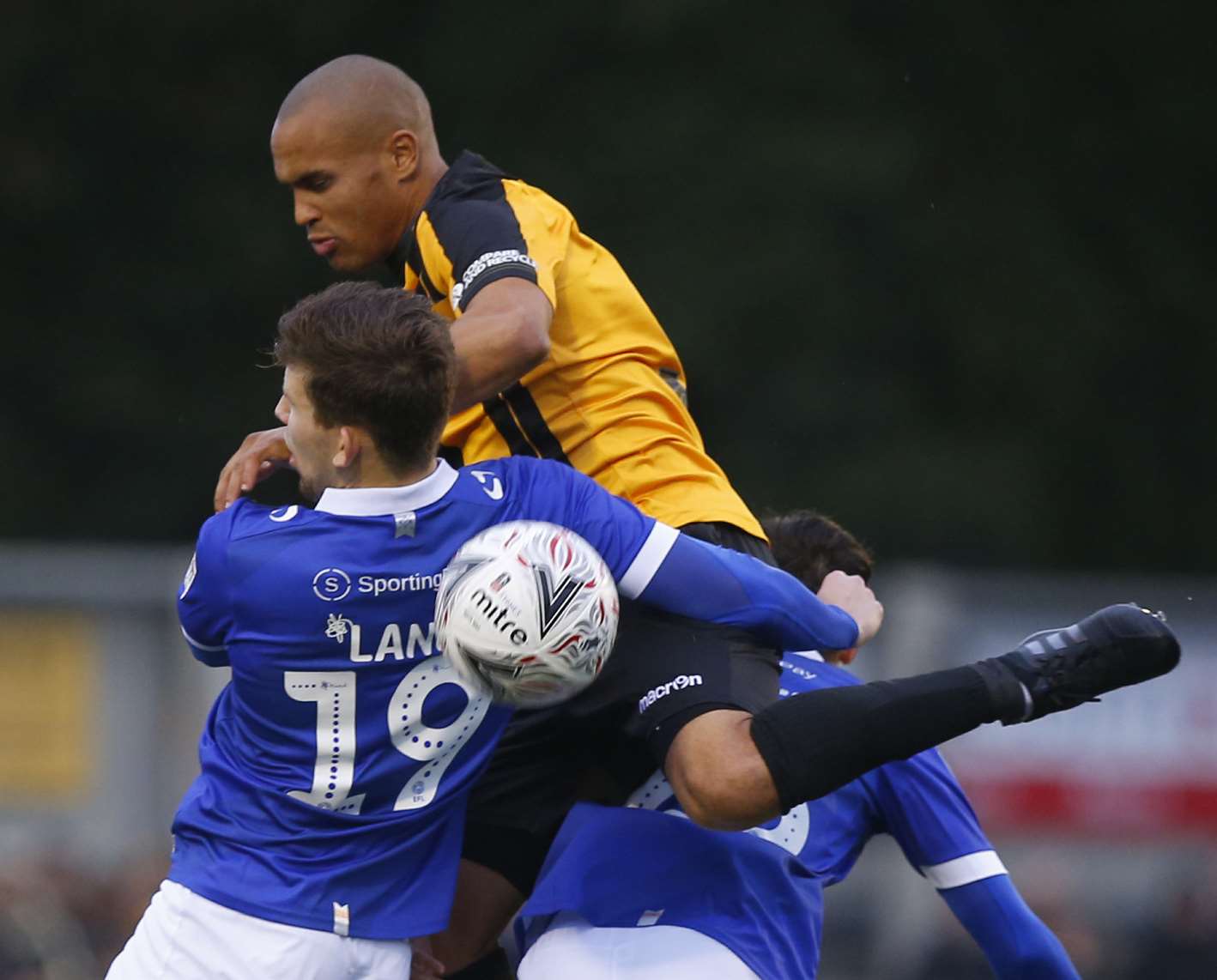 Maidstone United forward Elliott Romain gets into a tangle Picture: Andy Jones