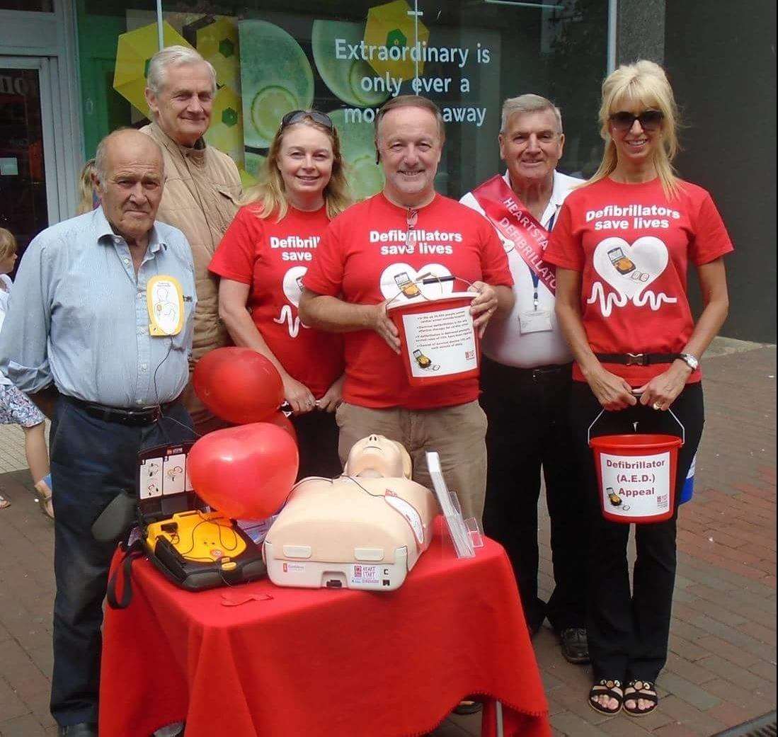 Cllr Wayne Elliott with Trevor Bond (far left) and Beverley-Jayne Last (far right) during his work for Heartstart