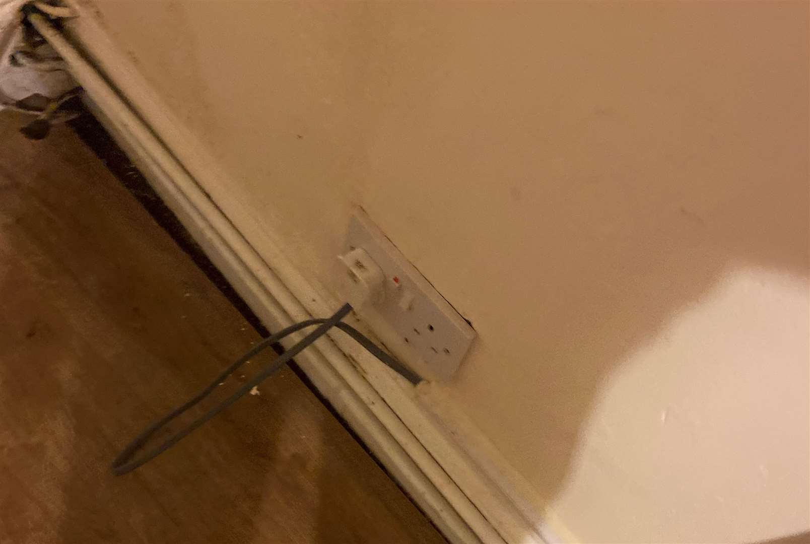 Wires coming out of the wall in the room at Ashford Central Guest House. Picture: Jade Connor