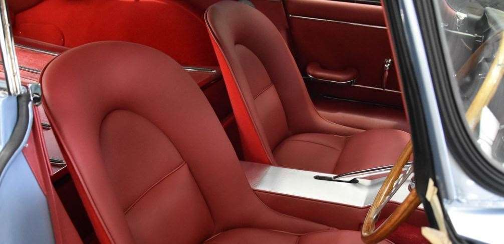 The gorgeous new oxblood red leather seats