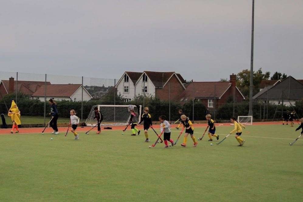 Youngsters using Maidstone Hockey Club's synthetic pitch, which is set to be replaced this summer ahead of the 2022/23 season
